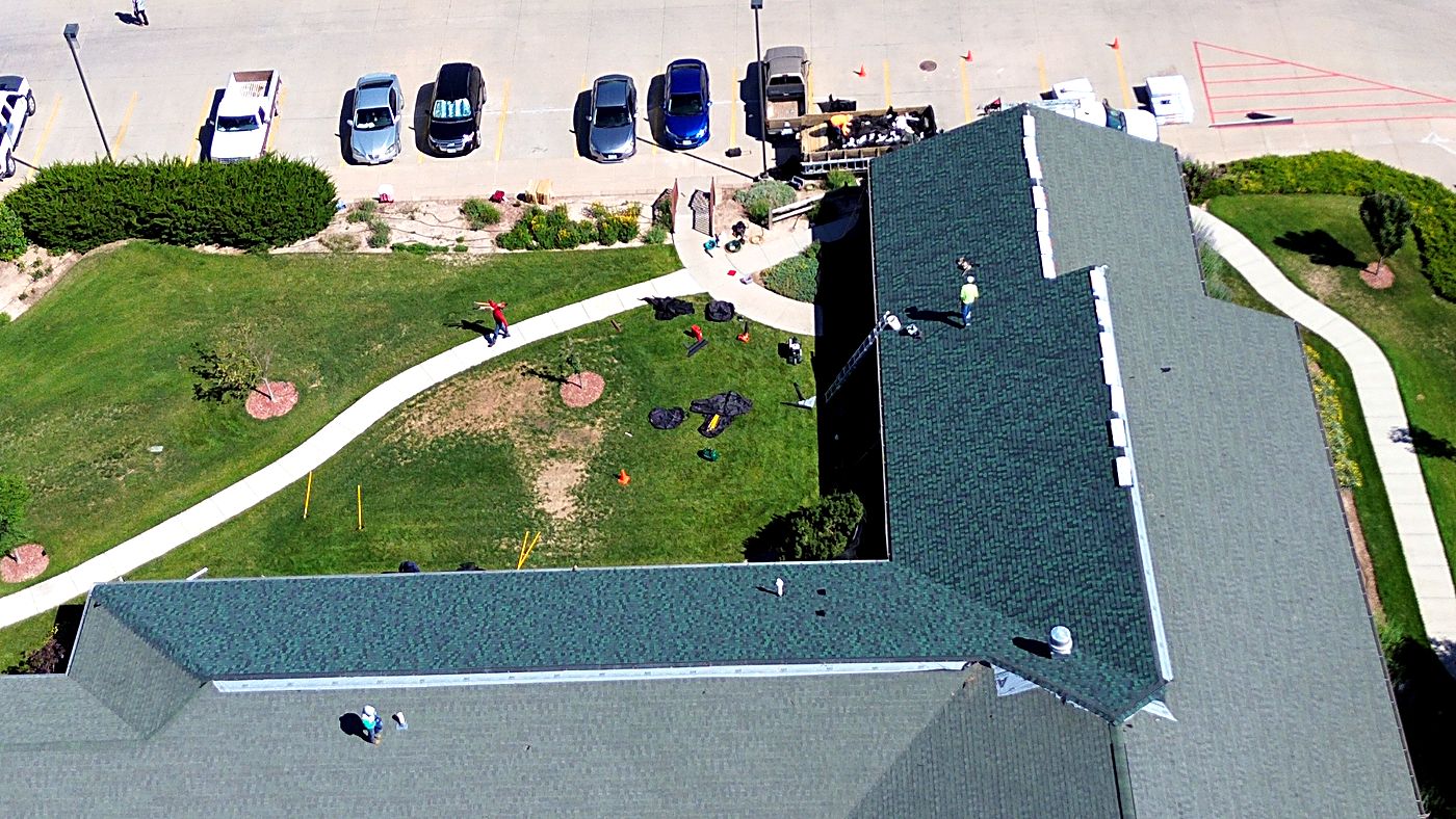Aerial view of a commercial facility re-roof in progress in Western Nebraska