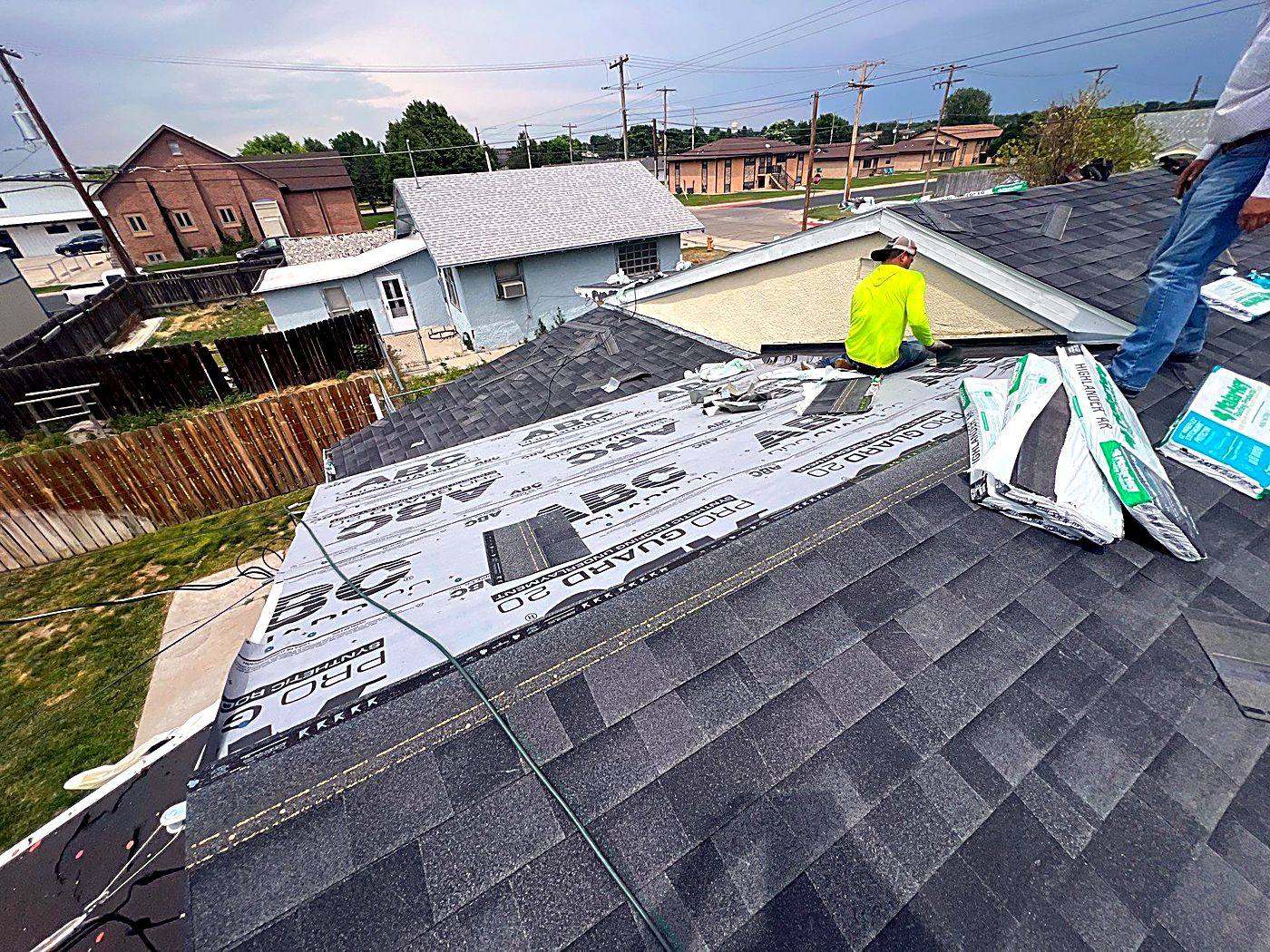 Crew finishing the ridge on the Jacobs residence in Scottsbluff, house and garage re-roofed